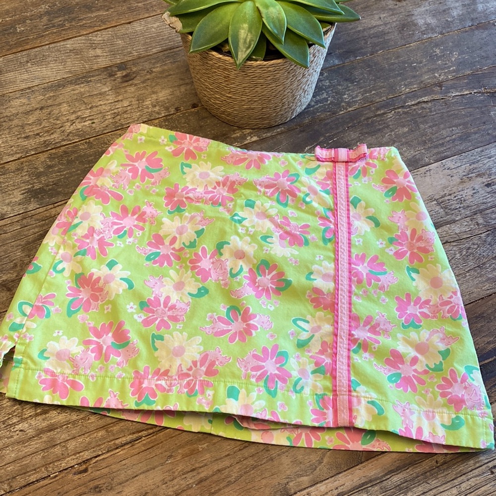 Lilly Pulitzer girls size 7 skirt. Bright green and pink flowers with rhinos.